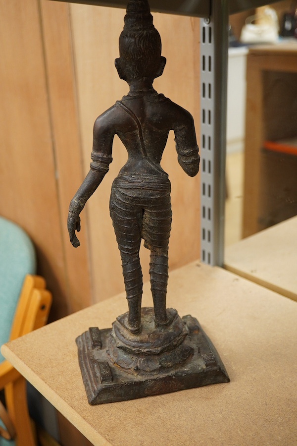 A South Indian cast iron figure of Parvati, 34cm high. Condition - fair